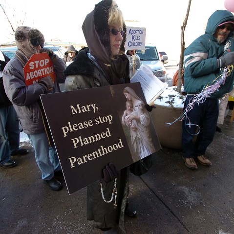 Donna Davis of Scranton, Pa. co-leader of Catholics Defending Life Prayer and Awareness Team, takes part during a "Stand Up for Life Rally" held in front of the Planned Parenthood Center on Penn Avenue in downtown Scranton, Pa. on Tuesday, Jan. 22,...