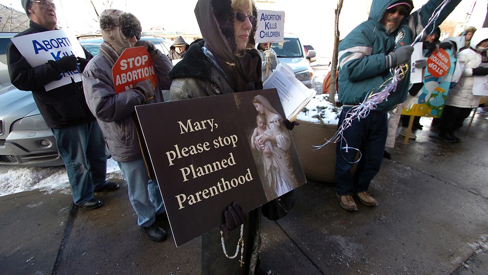Donna Davis of Scranton, Pa. co-leader of Catholics Defending Life Prayer and Awareness Team, takes part during a "Stand Up for Life Rally" held in front of the Planned Parenthood Center on Penn Avenue in downtown Scranton, Pa. on Tuesday, Jan. 22,...
