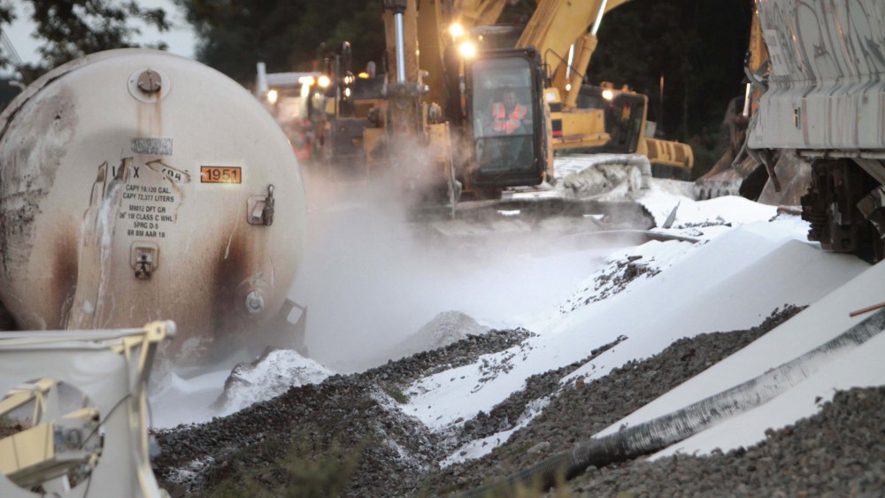Cleanup on a derailed Union Pacific train in Mer Rouge, La., Oct. 6, 2014. (Photo by Margaret Croft/The News-Star/AP)