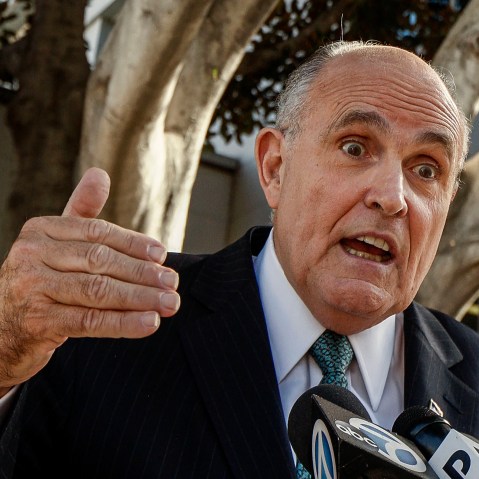 Lawyer and former New York City Mayor Rudy Giuliani comments on a lawsuit filed against video game giant Activision outside Los Angeles Superior court in Los Angeles, Calif., on Oct. 16, 2014. (Photo by Damian Dovarganes/AP)