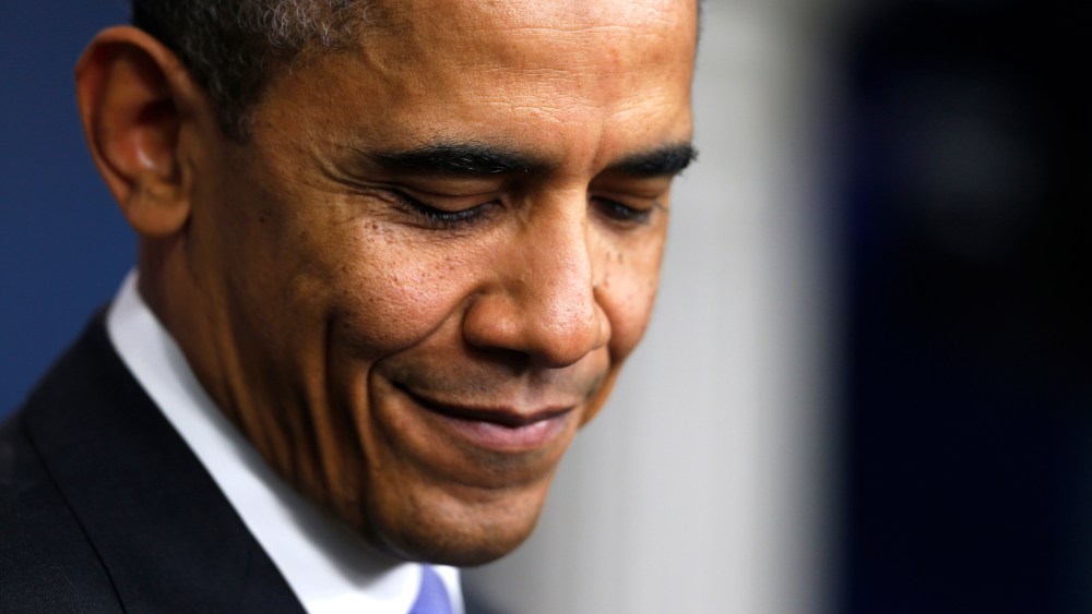 President Barack Obama smiles during a news conference in the Brady Press Room at the White House in Washington, D.C, Dec. 20, 2013.