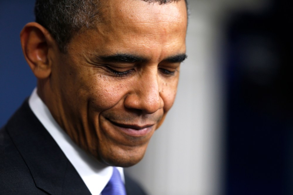 President Barack Obama smiles during a news conference in the Brady Press Room at the White House in Washington, D.C, Dec. 20, 2013.