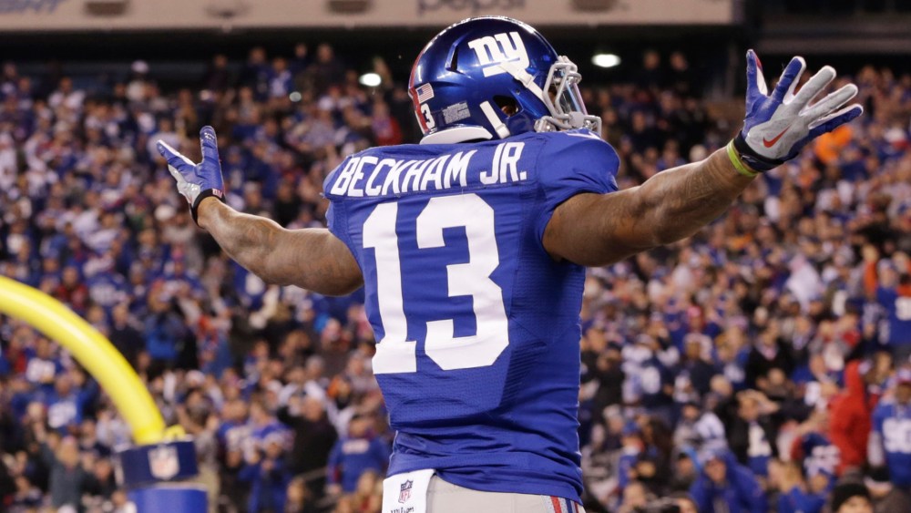 New York Giants wide receiver Odell Beckham Jr. reacts after making a one-handed catch for a touchdown against the Dallas Cowboys on Nov. 23, 2014, in East Rutherford, N.J. (Julio Cortez/AP)