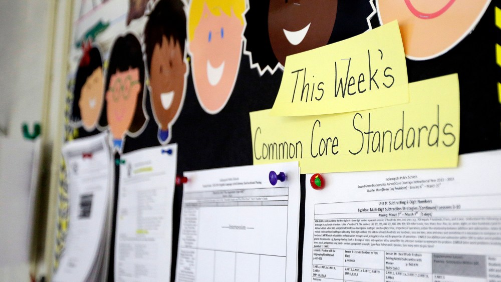 Common Core standards are posted on a bulletin board in a classroom.