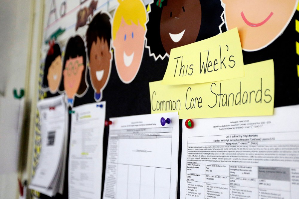 Common Core standards are posted on a bulletin board in a classroom.