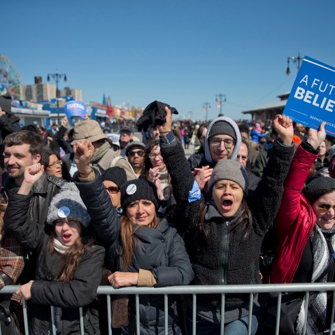 Supporters cheers as Democratic presidential candidate, Sen. Bernie Sanders, I-Vt., speaks during a rally on the Coney Island boardwalk in the Brooklyn borough of New York, April 10, 2016. (Photo by Mary Altaffer/AP)
