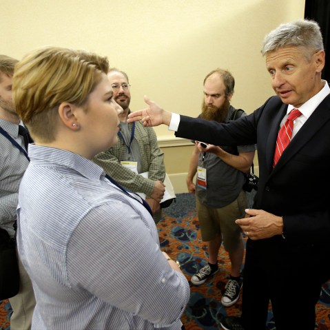 Libertarian presidential candidate Gary Johnson, right, speaks to supporters and delegates at the National Libertarian Party Convention, May 27, 2016, in Orlando, Fl. (Photo by John Raoux/AP)