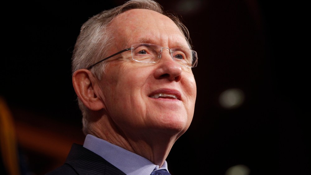 Senate Majority Leader Harry Reid of Nevada listens to a reporter's question about their meeting with Senate Republicans regarding the government shutdown and debt ceiling on Capitol Hill in Washington, Saturday, Oct. 12, 2013.