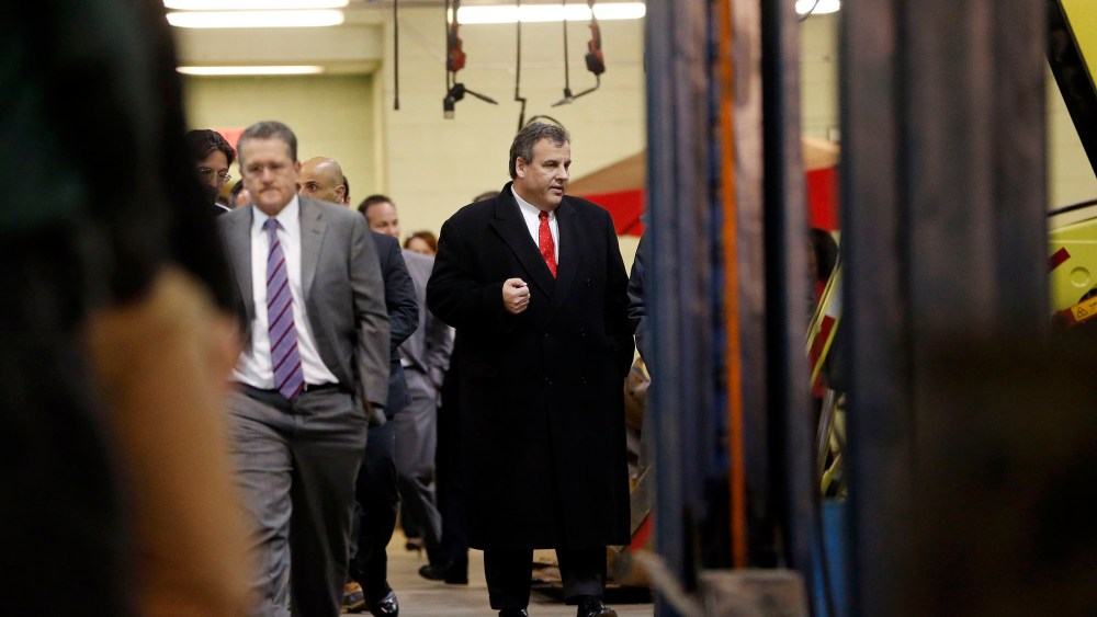 New Jersey Gov. Chris Christie leaves a boardroom at the Newark Department of Transportation after hearing a briefing ahead of a snowstorm, Jan. 22, 2016, in Newark, N.J. (Photo by Julio Cortez/AP)