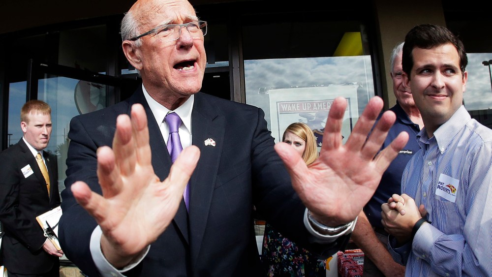 Republican Sen. Pat Roberts talks to supporters during a campaign stop on Sept. 24, 2014, in Overland Park, Kan.
