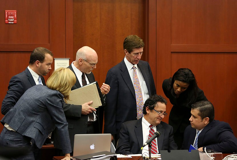 George Zimmerman, right, confers with his defense team during jury selection for his trial in Seminole circuit court in Sanford, Fla., Thursday, June 20, 2013. (Photo by Gary Green/Orlando Sentinel/Pool/AP)
