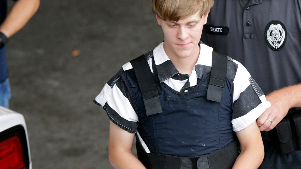 Dylann Storm Roof is escorted from the Cleveland County Courthouse in Shelby, N.C. on June 18, 2015. (Photo by Chuck Burton/AP)