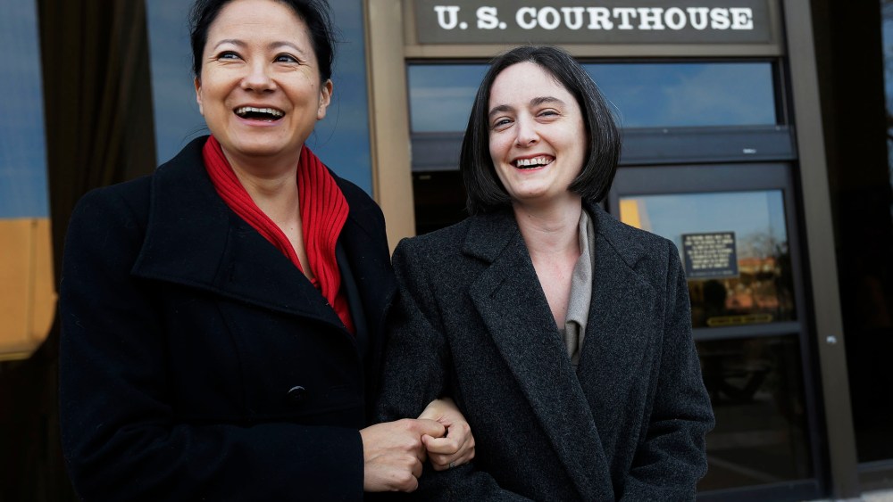 Cleopatra De Leon and partner, Nicole Dimetman, arrive at the U.S. Federal Courthouse in San Antonio,  Feb. 12, 2014.