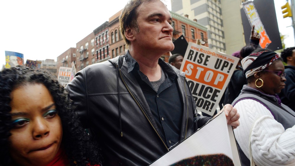 Director Quentin Tarantino participates in a rally to protest against police brutality, Oct. 24, 2015, in New York. Speakers at the protest said they want to bring justice for those who were killed by police. (Photo by Patrick Sison/AP)