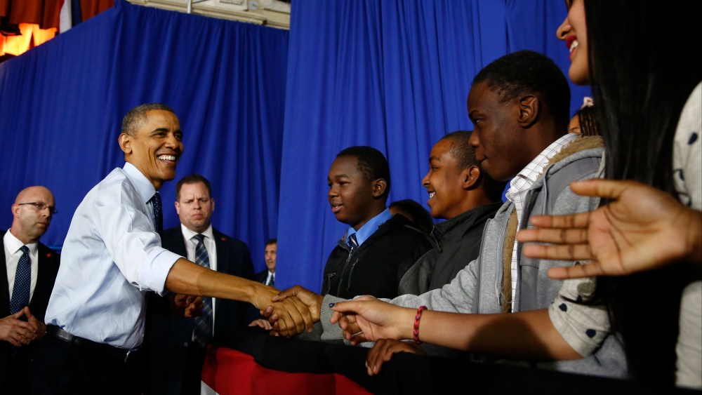 President Barack Obama greets students during his visit to Pathways in Technology Early College High School (P-TECH) in Brooklyn borough of New York, Friday, Oct. 25, 2013
