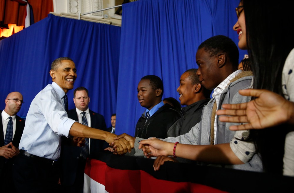 President Barack Obama greets students during his visit to Pathways in Technology Early College High School (P-TECH) in Brooklyn borough of New York, Friday, Oct. 25, 2013