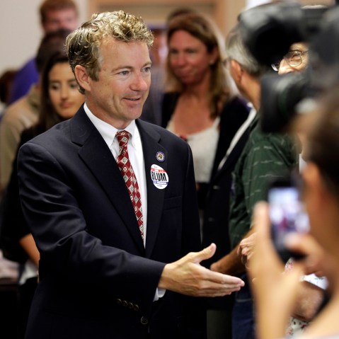 Sen. Rand Paul, R-Ky. is greeted by local Republicans before speaking at a gathering for local candidates, Aug. 5, 2014, in Hiawatha, Iowa.