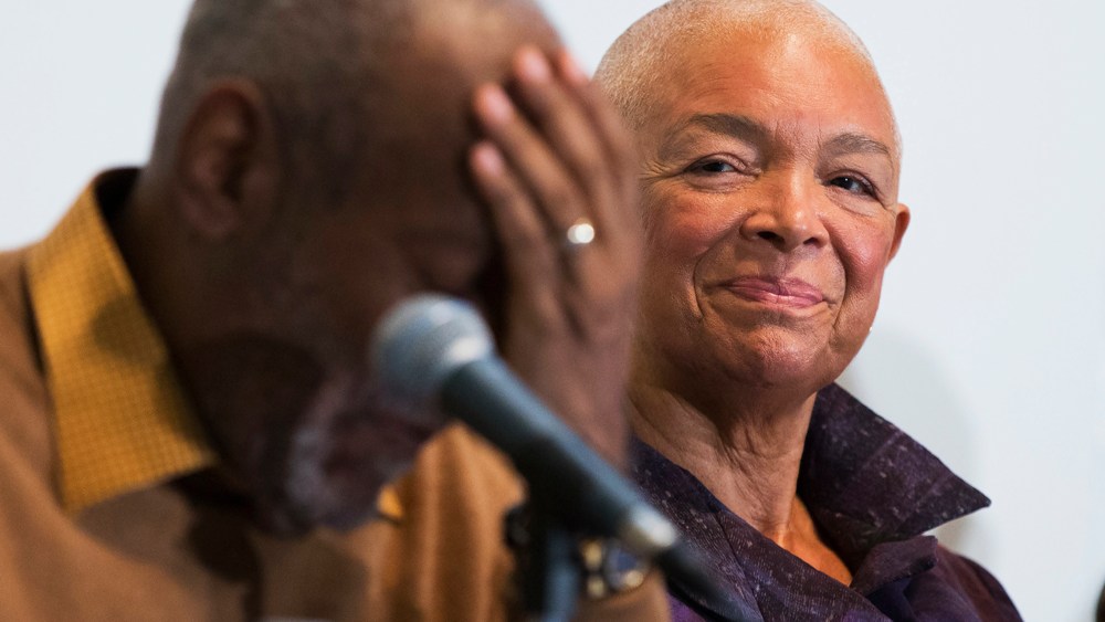 Camille Cosby watches her husband Bill Cosby pause during a news conference on Nov. 6, 2014. (Evan Vucci/AP)