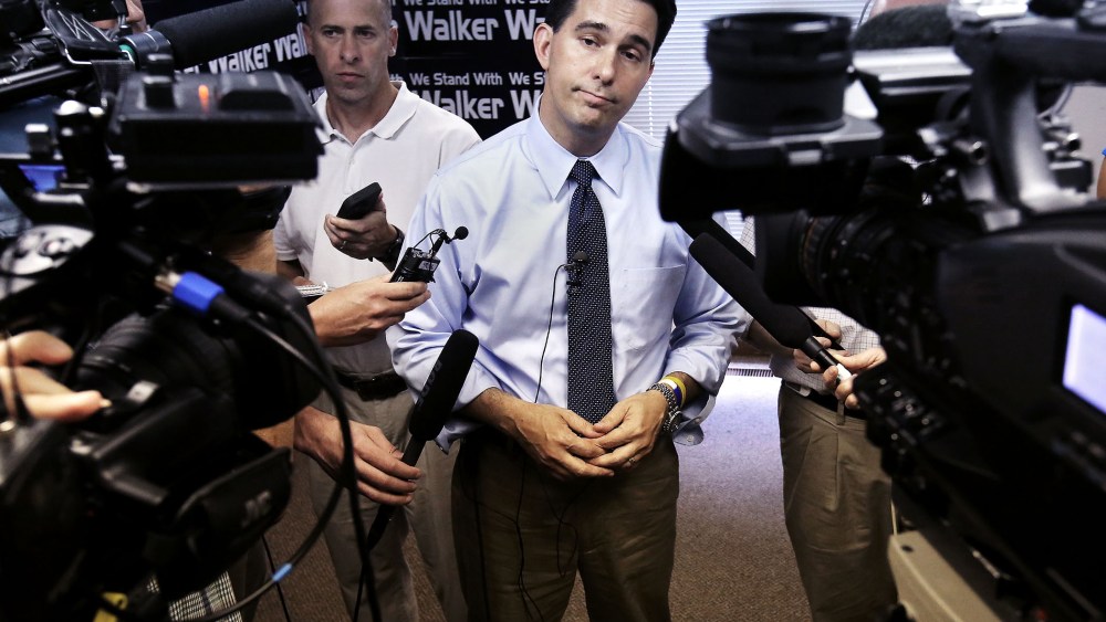 Wisconsin Governor Scott Walker addresses members of the media in Madison, Wis., July 22, 2014.