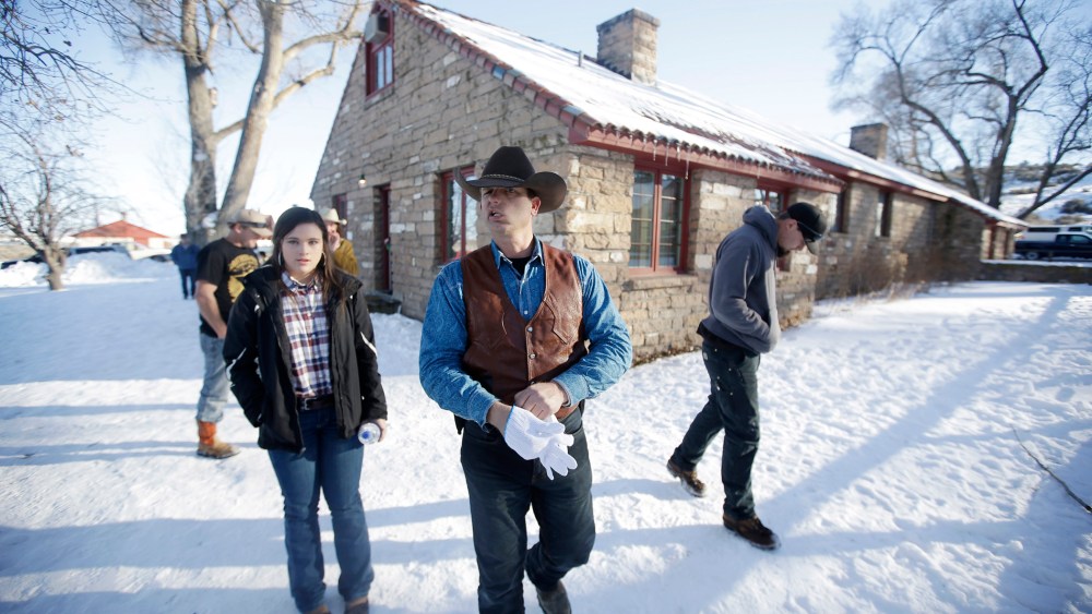Ryan Bundy, one of the sons of Nevada rancher Cliven Bundy, walks through the Malheur National Wildlife Refuge, Jan. 8, 2016, near Burns, Ore. (Photo by Rick Bowmer/AP)