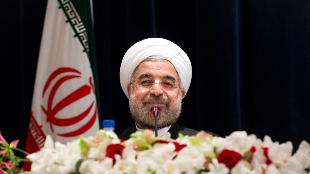 Iranian President Hassan Rouhani smiles at the end of a press conference, Sept. 27, 2013, in New York, N.Y.
