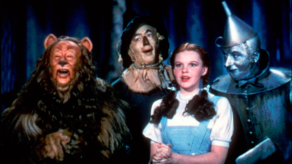 This 1939 file photo provided by Warner Bros. shows, from left, Bert Lahr as the Cowardly Lion, Ray Bolger as the Scarecrow, Judy Garland as Dorothy and Jack Haley as the Tin Woodman in a scene from "The Wizard of Oz."