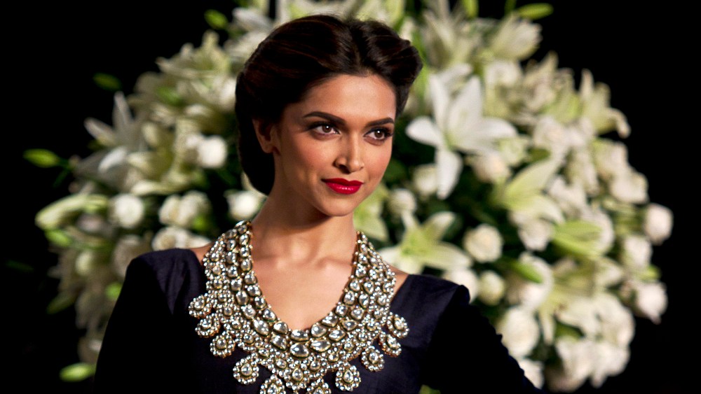 In this Sunday, Aug 4, 2013, photo Bollywood actor Deepika Padukone is seen at an event during the Delhi Couture Week in New Delhi, India. (Photo by Tsering Topgyal/AP)
