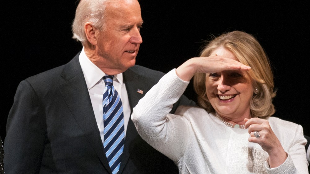 Vice President Joe Biden and former Secretary of State Hillary Rodham Clinton appear onstage at the Vital Voices Global Partnership 2013 Global Leadership Awards gala at the Kennedy Center for the Performing Arts in Washington, Tuesday, April 2, 2013. ...
