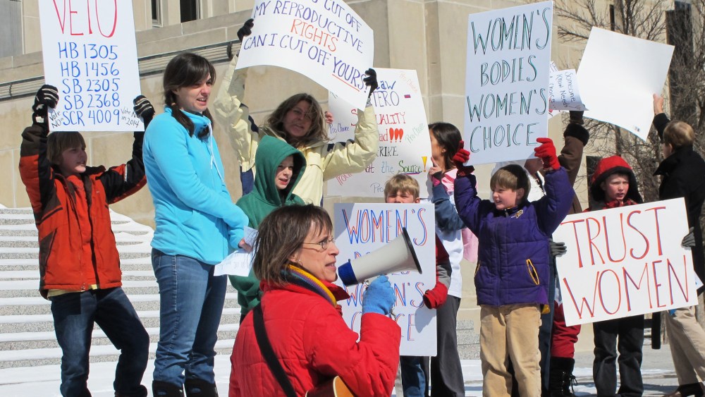 Protesters at an abortion-rights rally at the state Capitol in Bismarck, N.D. Mar. 25, 2013.