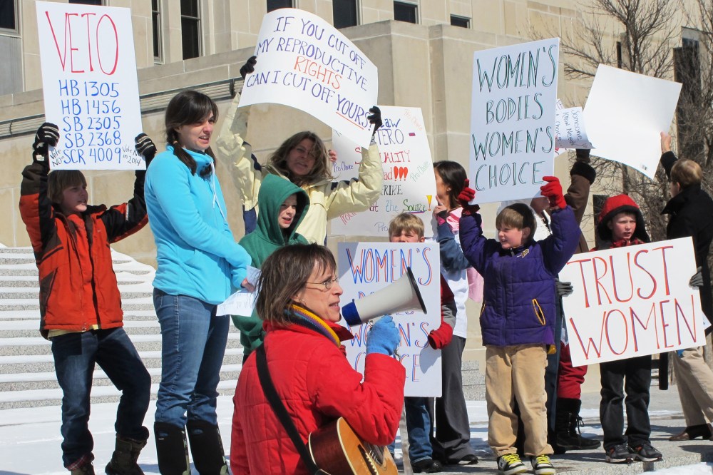 Protesters at an abortion-rights rally at the state Capitol in Bismarck, N.D. Mar. 25, 2013.