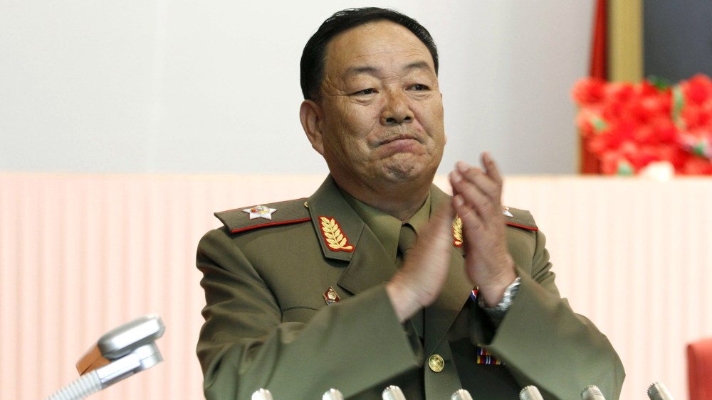 Vice Marshal Hyon Yong Chol applauds during a meeting at the April 25 House of Culture announcing North Korean leader Kim Jong Un's new title of marshal, July 18, 2012, in Pyongyang, North Korea. (Photo by Jon Chol Jin/AP)