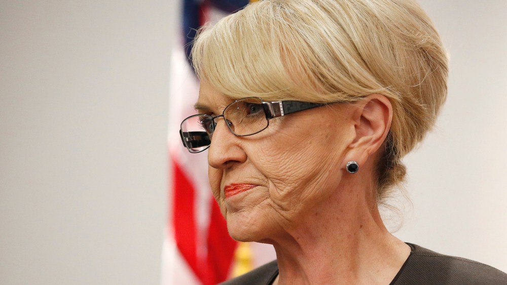 Arizona Republican Gov. Jan Brewer pauses during a news conference, Feb. 26, 2014, in Phoenix, Ariz.