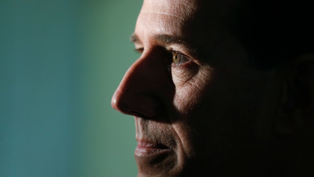 Former Republican presidential candidate and US Sen. Rick Santorum talks to reporters at the Capitol on March 17, 2015, in Albany, NY. (Photo by Mike Groll/AP)