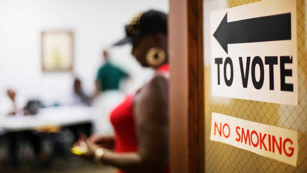A sign directs voters at a polling site on July 22, 2014, in Atlanta, Ga.