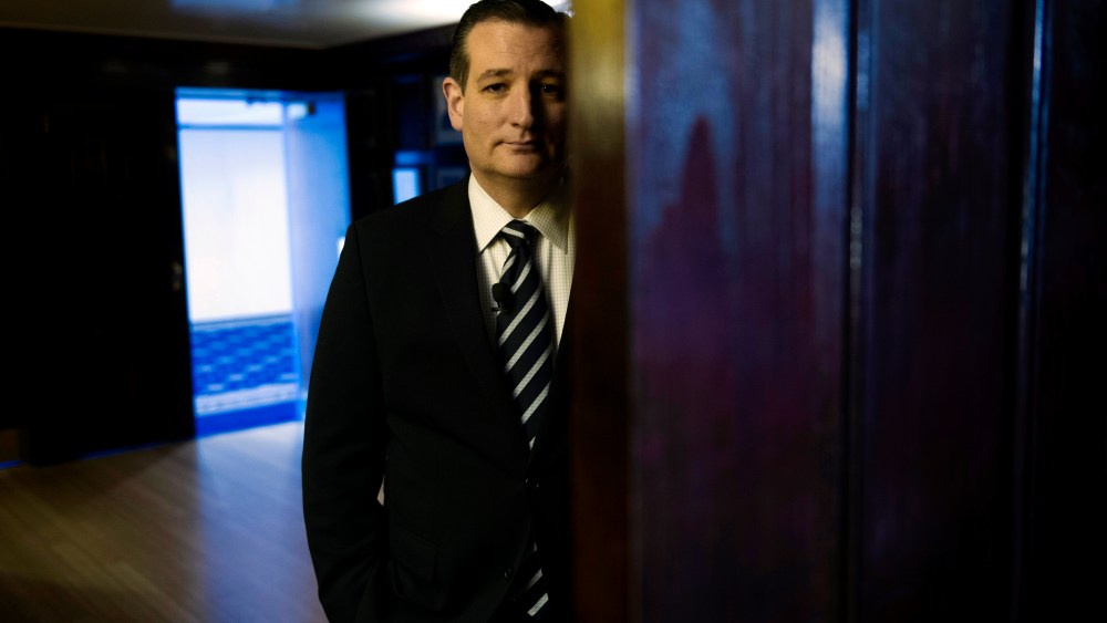 Republican presidential candidate Sen. Ted Cruz, R-Texas waits to be announced to speak at the Hispanic Chamber of Commerce (USHCC) meeting, April 29, 2015, at the National Press Club in Washington. (Photo by Cliff Owen/AP)