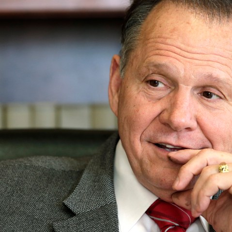 In this Oct. 24, 2012 file photo, former Chief Justice Roy Moore poses for a photo in his Montgomery, Ala., office. (Photo by Dave Martin/AP)
