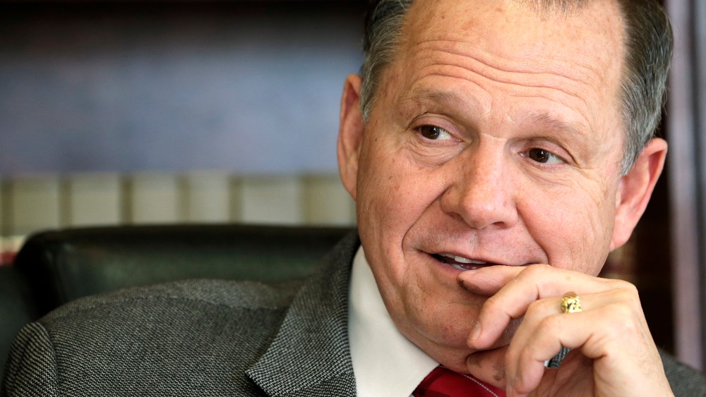 In this Oct. 24, 2012 file photo, former Chief Justice Roy Moore poses for a photo in his Montgomery, Ala., office. (Photo by Dave Martin/AP)