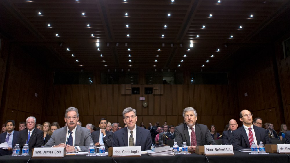 From left, Deputy Attorney General James Cole; National Security Agency Deputy Director John C. Inglis; Robert Litt, general counsel in the Office of Director of National Intelligence; and Sean Joyce, deputy director of the FBI, wait to testify on...