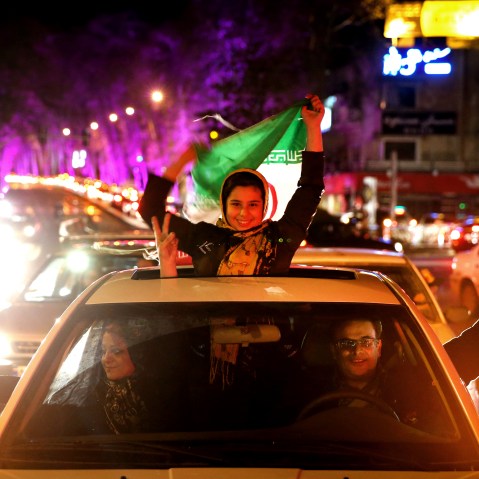 Iranians celebrate on a street in northern Tehran, Iran, April 2, 2015, after Iran's nuclear agreement with world powers in Lausanne, Switzerland. (Photo by Ebrahim Noroozi/AP)