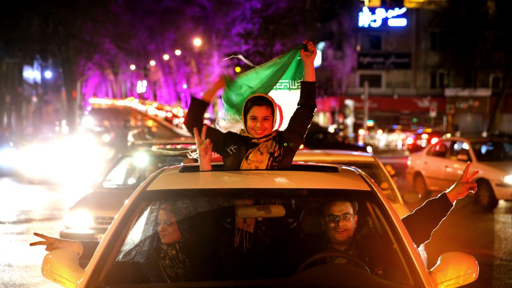 Iranians celebrate on a street in northern Tehran, Iran, April 2, 2015, after Iran's nuclear agreement with world powers in Lausanne, Switzerland. (Photo by Ebrahim Noroozi/AP)