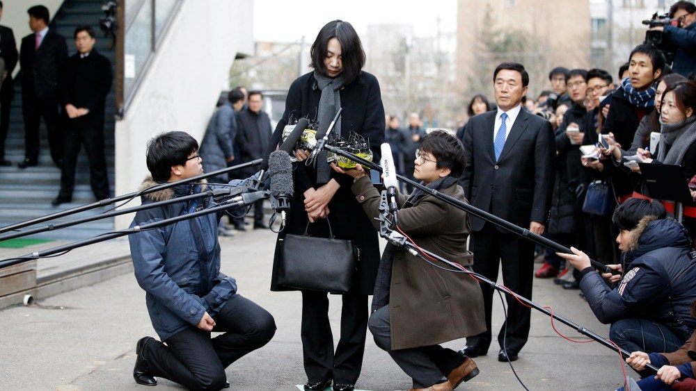 In this Dec. 12, 2014 photo, Cho Hyun-ah, who was head of cabin service at Korean Air and the oldest child of Korean Air chairman Cho Yang-ho, speaks to the media in Seoul, South Korea. (Photo by Lee Jin-man/AP)