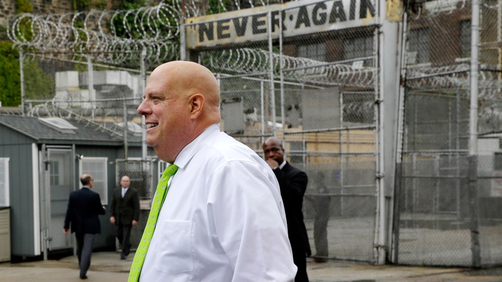 Maryland Gov. Larry Hogan arrives at Baltimore City Detention Center, July 30, 2015, to announce his plan to immediately shut down the jail. (Photo by Patrick Semansky/AP)