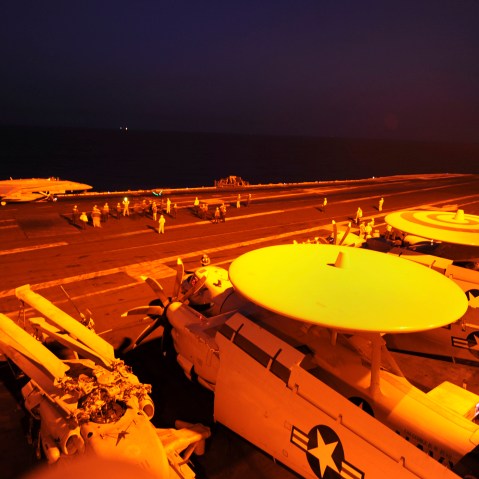 In this file photo released by the U.S. Navy on Tuesday, Sept. 23, 2014, A-18C Hornet prepares to launch from the flight deck to conduct strike missions against Islamic State group targets, in the Arabian Gulf. (Robert Burck/U.S. Navy-File/AP)
