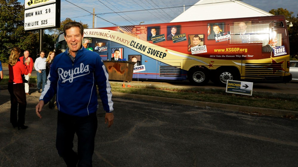 Kansas Republican Gov. Sam Brownback arrives at a campaign event on Nov. 1, 2014, in Topeka, Kan.