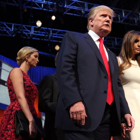Republican presidential candidate Donald Trump leaves the stage with his wife Melania Trump and his daughter, Ivanka Trump. after the first Republican presidential debate, Aug. 6, 2015, in Cleveland. (Photo by Andrew Harnik/AP)