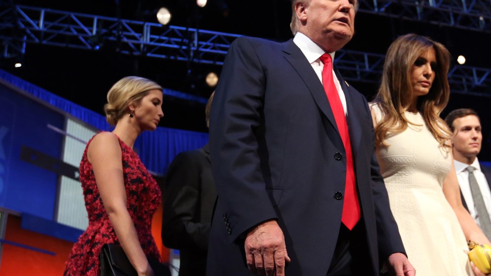Republican presidential candidate Donald Trump leaves the stage with his wife Melania Trump and his daughter, Ivanka Trump. after the first Republican presidential debate, Aug. 6, 2015, in Cleveland. (Photo by Andrew Harnik/AP)