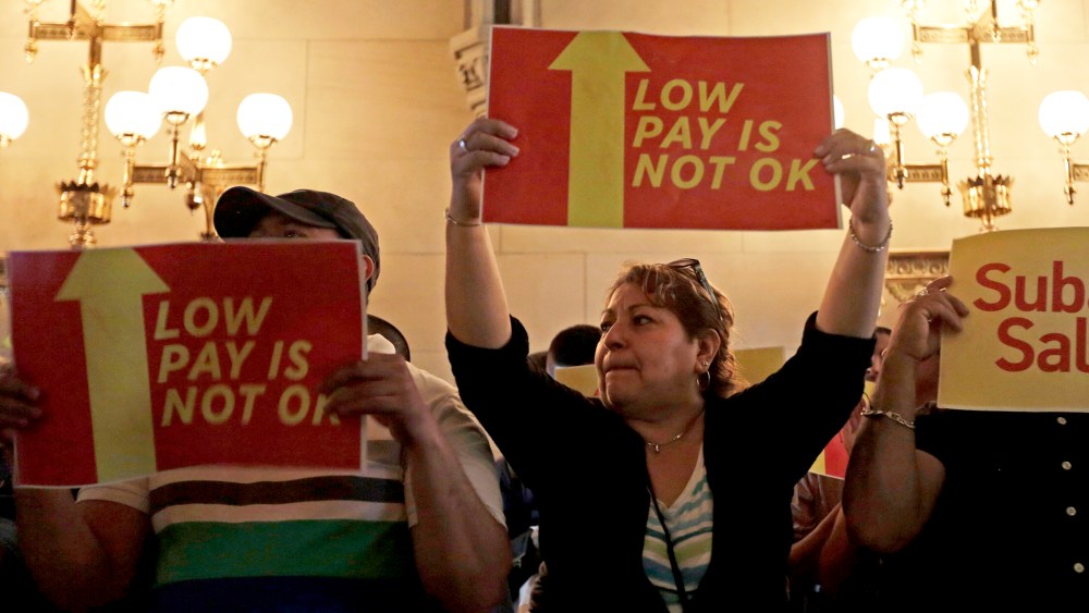 Protesters advocate for a raise in the minimum wage at the Capitol on Tuesday, June 17, 2014, in Albany, N.Y.