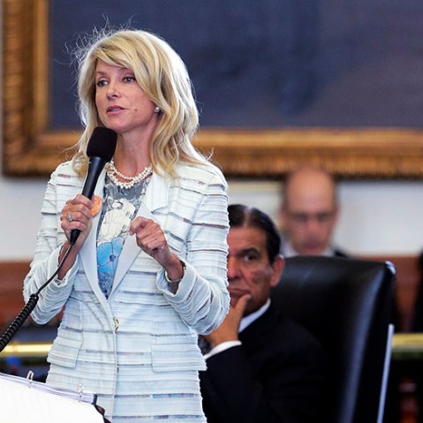 Standing in front of a portrait of President Lyndon B. Johnson, Sen. Wendy Davis, D-Fort Worth, begins a filibuster in an effort to kill an abortion bill, Tuesday, June 25, 2013, in Austin, Texas. The bill would ban abortion after 20 weeks of pregnancy...