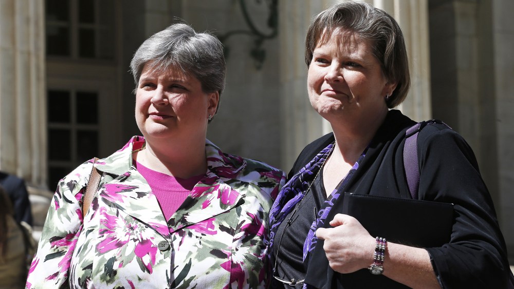 In this April 17, 2014 file photo, plaintiffs challenging Oklahoma's gay marriage ban, Sharon Baldwin, left, and her partner Mary Bishop, leave court following a hearing at the 10th U.S. Circuit Court of Appeals in Denver.