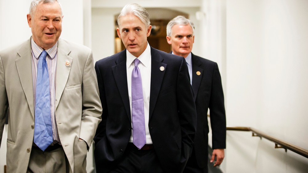 Rep. Trey Gowdy, R-S.C., center, walks to a House Republican Conference meeting at the Capitol, May 7, 2014.